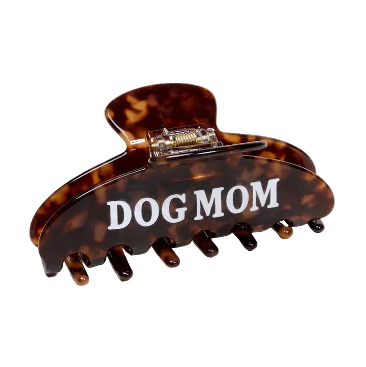 Tortoiseshell hair clip with 'DOG MOM' text on a white background