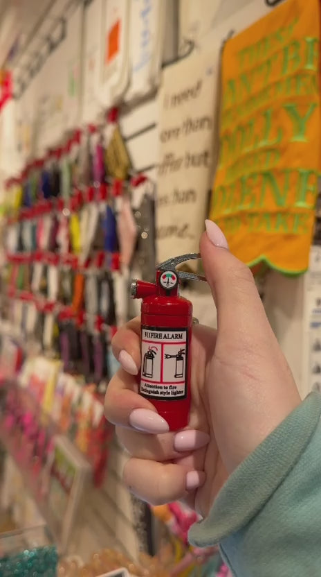 Load video: Fire Extinguisher Lighter
